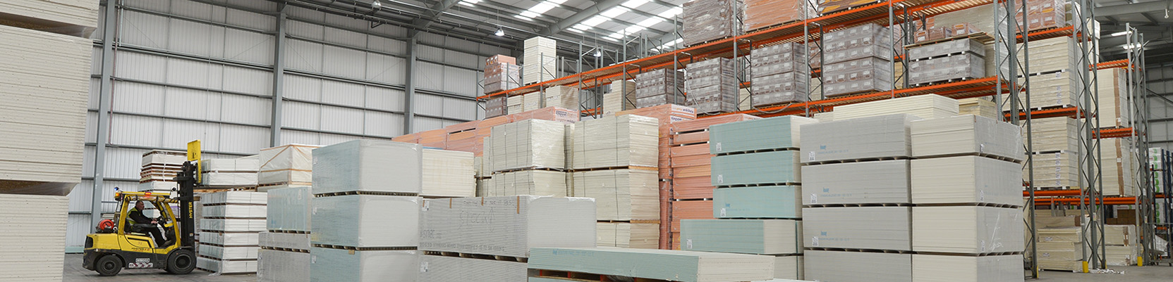 Plasterboard and insulation stock in a warehouse