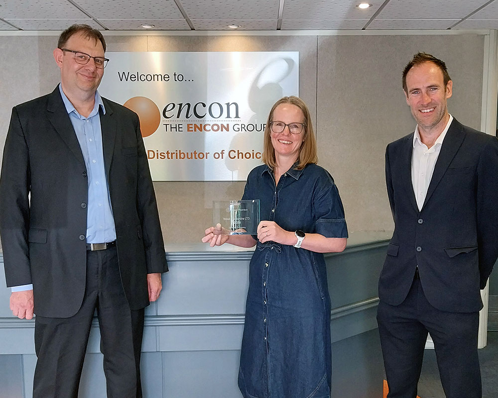 Helen Hindmarch, Finance Director, collects the West Yorkshire Ltd award from representatives of Grant Thornton