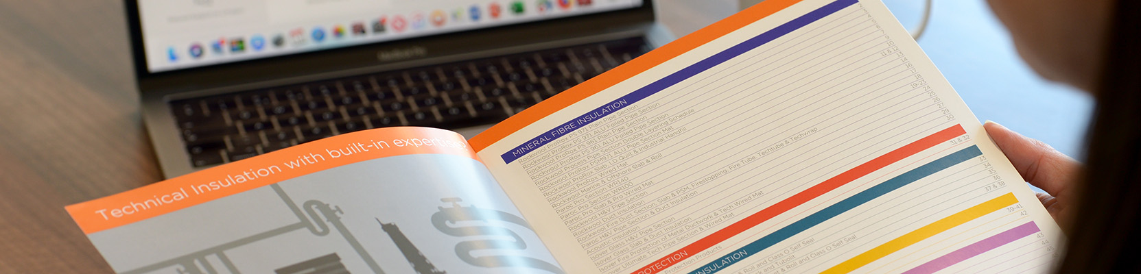 A person reading the Encon Technical Solution Price Guide