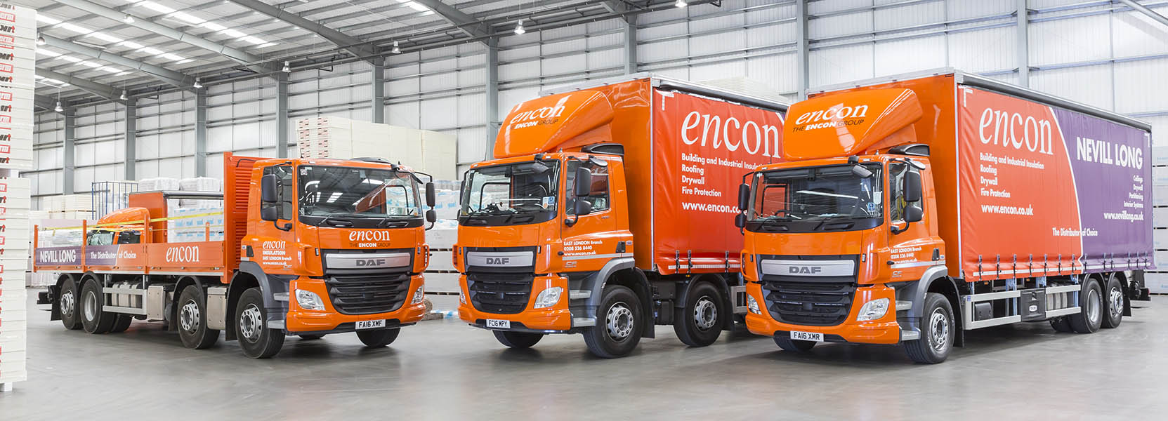 Encon Insulation And Nevill Long Trucks And Flat Bed In Warehouse