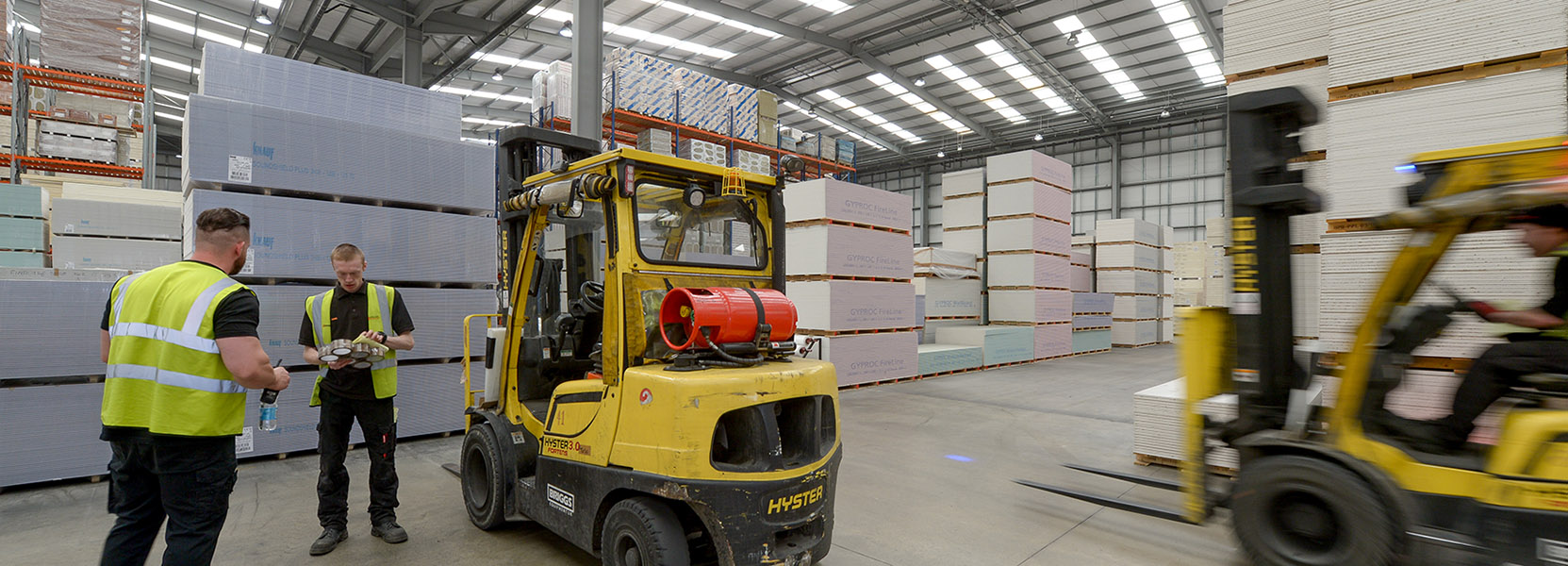 Team working in an Encon and Nevill Long warehouse